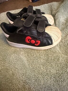 adidas Kids Black and White Sneakers with Red Bow Accent